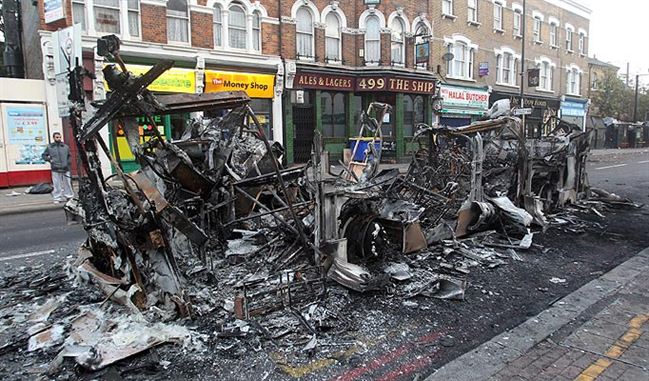 Destroyed   charred skeleton double decker bus torched yobs